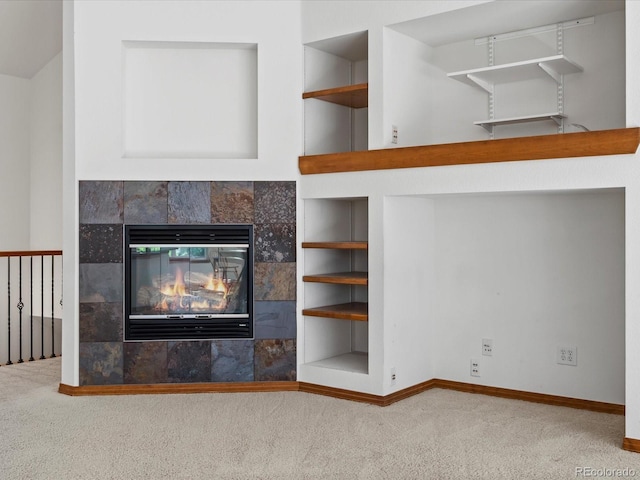 7254 S Kellerman Way, Aurora, CO 80016 - detailed view of carpet floors, a tile fireplace, and built in features