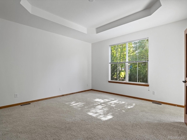 7254 S Kellerman Way, Aurora, CO 80016 - carpeted empty room featuring a raised ceiling and baseboards
