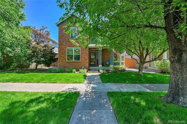 7064 E 2nd Ave, Denver, CO 80220 - view of front of house with brick siding