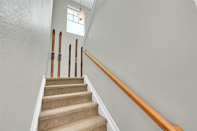 7064 E 2nd Ave, Denver, CO 80220 - stairway with a textured wall