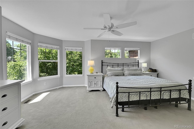 7064 E 2nd Ave, Denver, CO 80220 - carpeted bedroom with multiple windows, baseboards, and a ceiling fan