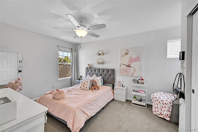 7064 E 2nd Ave, Denver, CO 80220 - bedroom with light colored carpet and a ceiling fan