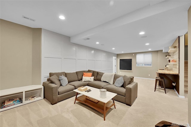 7064 E 2nd Ave, Denver, CO 80220 - living room featuring light colored carpet, recessed lighting, and baseboards