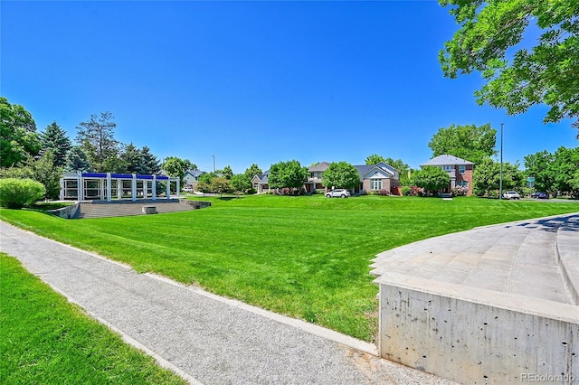 7064 E 2nd Ave, Denver, CO 80220 - view of grassy yard with a residential view