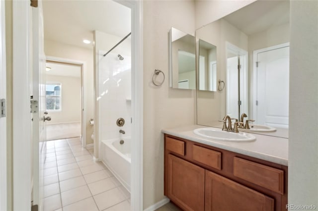 full bath featuring vanity, shower / bathtub combination, and tile patterned flooring