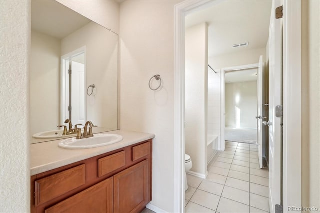 full bath featuring vanity, visible vents, tile patterned flooring, toilet, and shower / bathtub combination