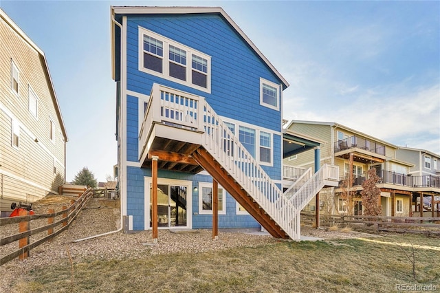 rear view of house with stairway