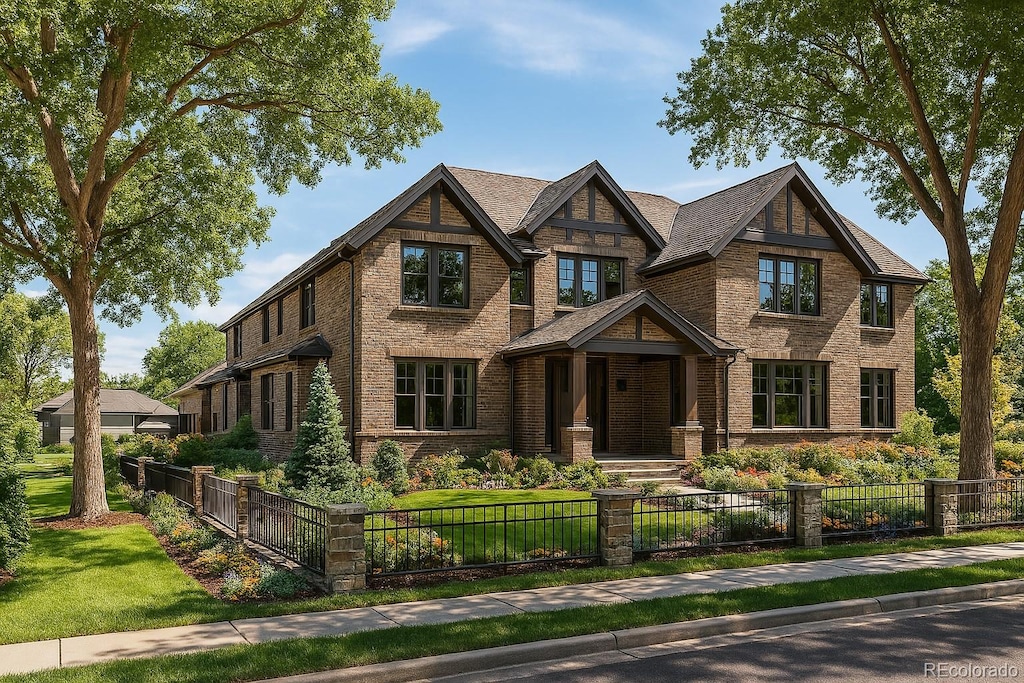 343 S Gaylord St, Denver, CO 80209 - craftsman-style house with a front yard, brick siding, and a fenced front yard