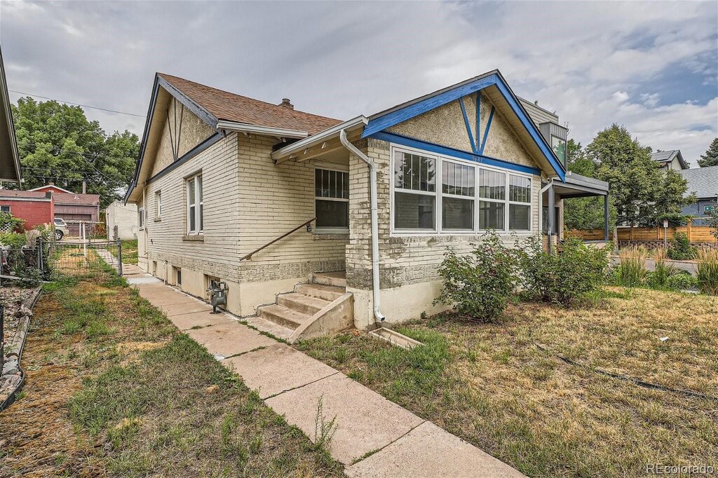 3637 Lowell Blvd, Denver, CO 80211 - view of front facade featuring a front yard