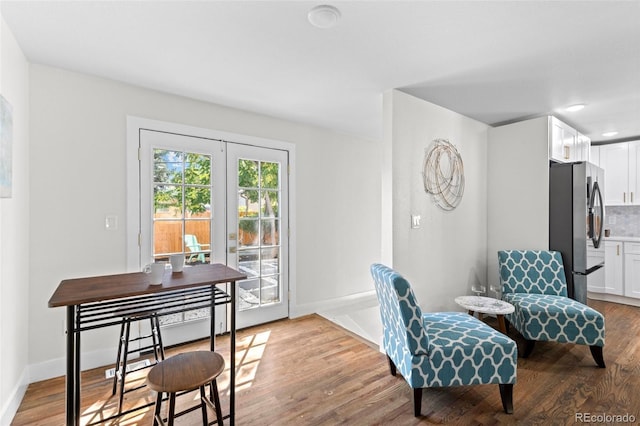 sitting room with light hardwood / wood-style flooring