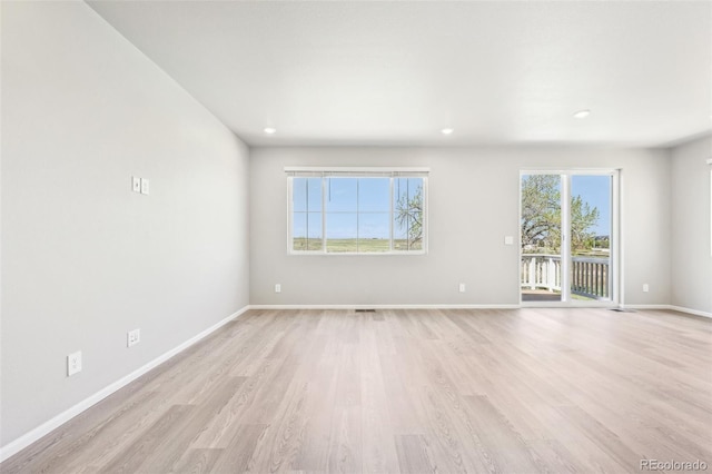 1957 S Coolidge Way, Aurora, CO 80018 - empty room featuring light wood-type flooring, baseboards, and recessed lighting