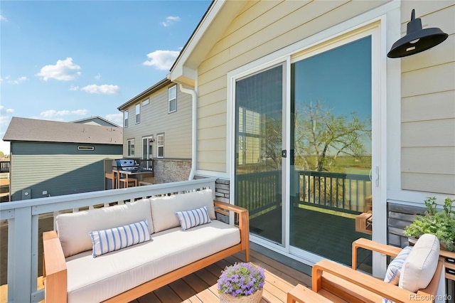 1957 S Coolidge Way, Aurora, CO 80018 - wooden deck with an outdoor living space and grilling area