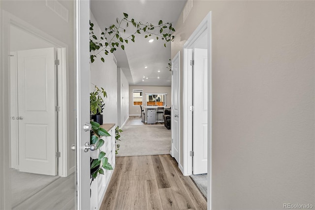 503 Bobcat Ct, Wiggins, CO 80654 - hall with light wood-style flooring and baseboards