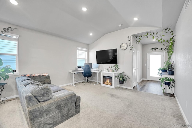 503 Bobcat Ct, Wiggins, CO 80654 - living room with carpet flooring, vaulted ceiling, recessed lighting, and baseboards
