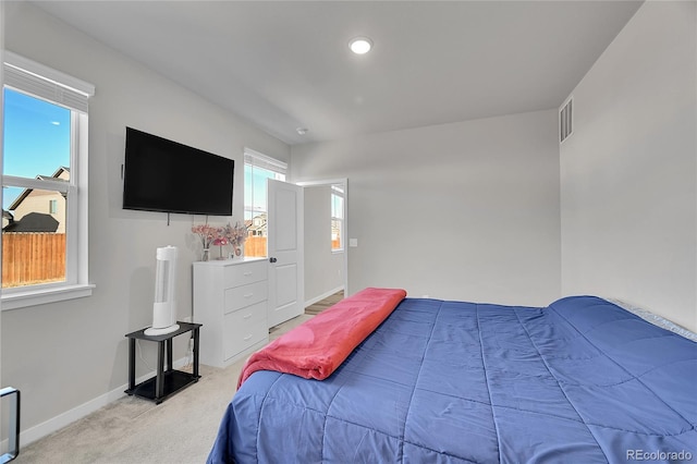 503 Bobcat Ct, Wiggins, CO 80654 - bedroom featuring light carpet and baseboards