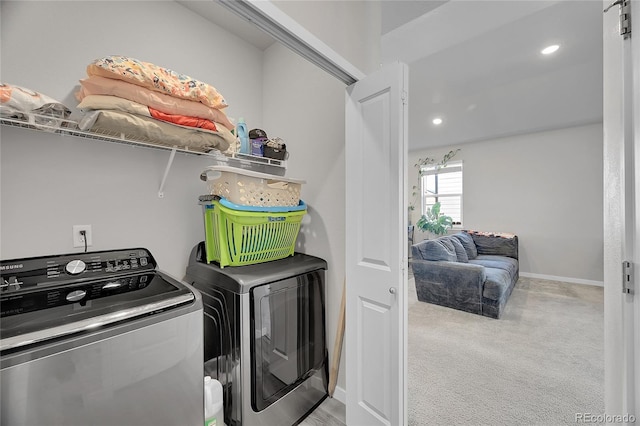 503 Bobcat Ct, Wiggins, CO 80654 - laundry room with independent washer and dryer, carpet floors, and recessed lighting
