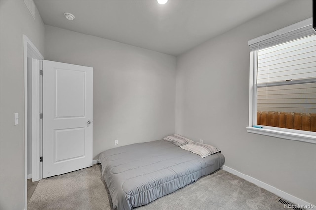 503 Bobcat Ct, Wiggins, CO 80654 - bedroom with carpet and baseboards