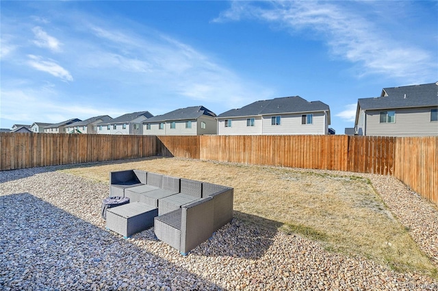 503 Bobcat Ct, Wiggins, CO 80654 - fenced backyard featuring a residential view and an outdoor living space