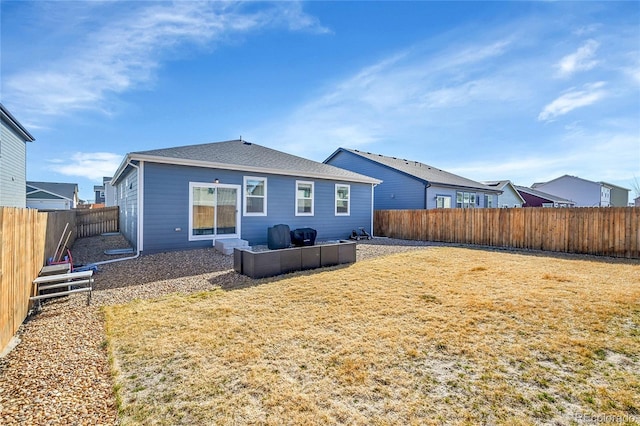 503 Bobcat Ct, Wiggins, CO 80654 - back of house with a shingled roof