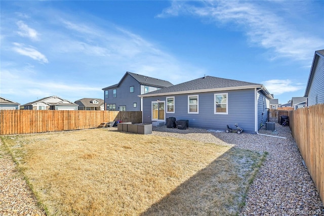 503 Bobcat Ct, Wiggins, CO 80654 - back of house featuring central AC unit