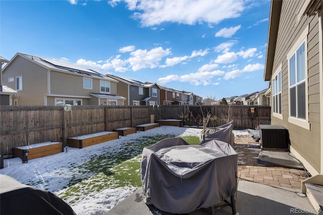 view of yard layered in snow