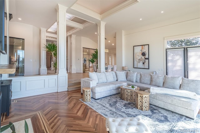 living room with recessed lighting and ornate columns