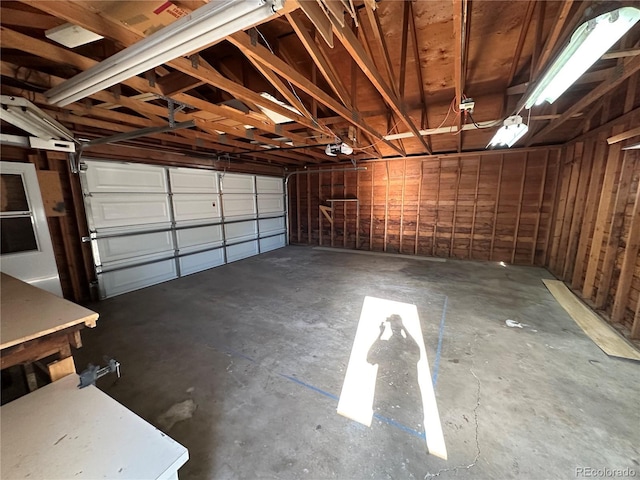garage featuring a garage door opener