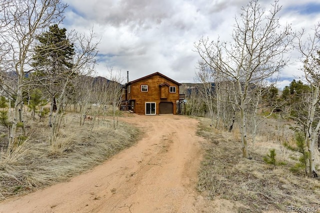 view of road featuring driveway