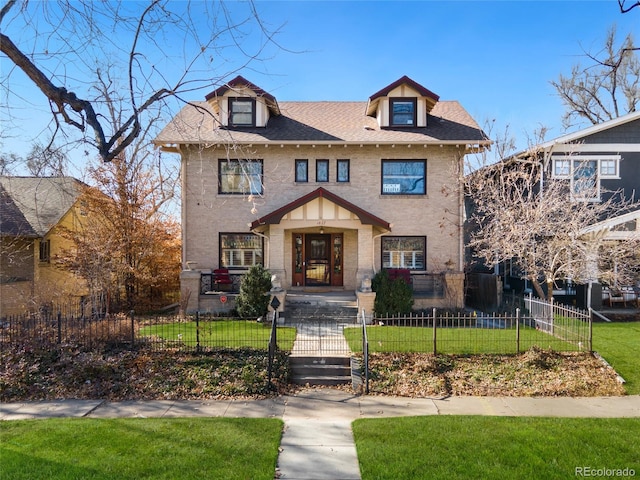 view of front of house with a front lawn