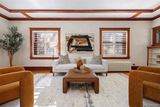 living room featuring coffered ceiling, radiator, hardwood / wood-style flooring, and beamed ceiling