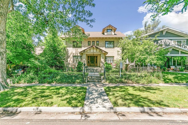 view of front of house with a front lawn