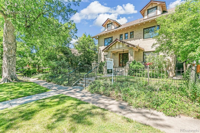 view of front of home with a front lawn