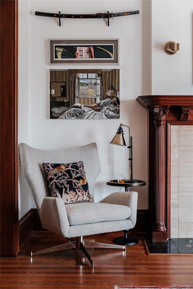 living area with hardwood / wood-style flooring