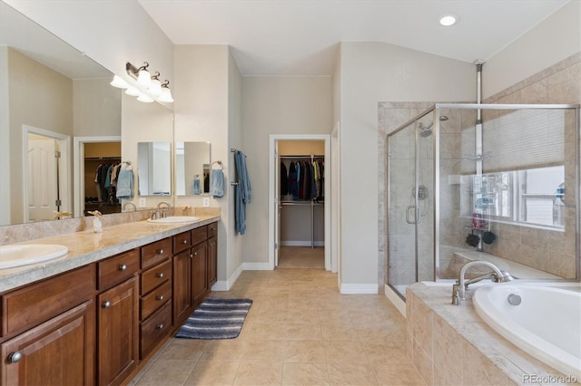 8714 E 148th Cir, Thornton, CO 80602 - full bathroom featuring a sink, a shower stall, double vanity, and a garden tub