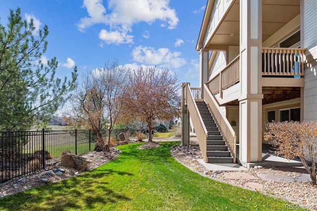 8714 E 148th Cir, Thornton, CO 80602 - view of yard featuring fence and stairs