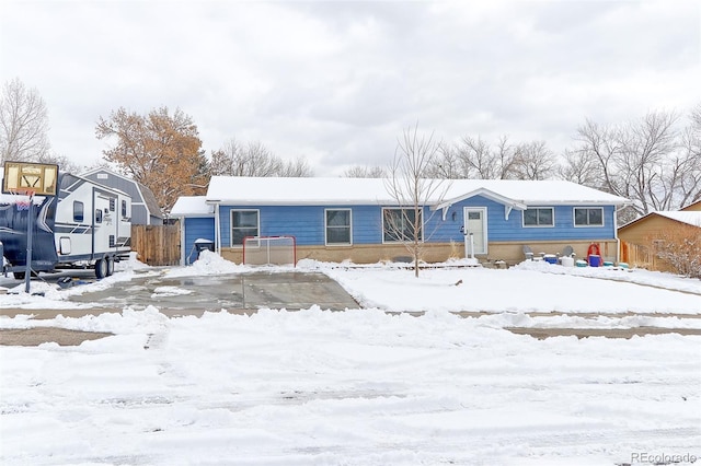 ranch-style home with a garage