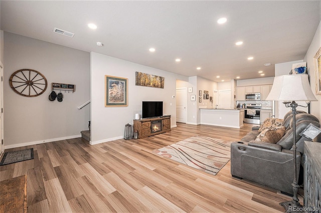 living room featuring light hardwood / wood-style flooring