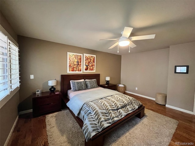 85 S Sherwood Gln, Monument, CO 80132 - bedroom with wood finished floors, baseboards, and a ceiling fan