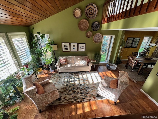 85 S Sherwood Gln, Monument, CO 80132 - living room with plenty of natural light, lofted ceiling, wood finished floors, and wood ceiling