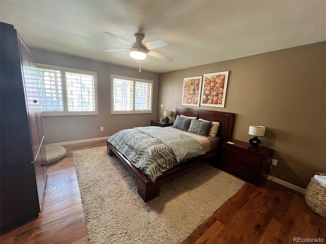 85 S Sherwood Gln, Monument, CO 80132 - bedroom with wood finished floors, baseboards, and a ceiling fan