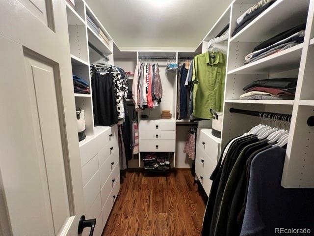 85 S Sherwood Gln, Monument, CO 80132 - spacious closet featuring dark wood-style floors