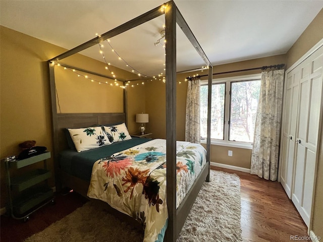 85 S Sherwood Gln, Monument, CO 80132 - bedroom with wood finished floors and baseboards
