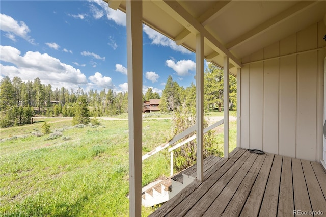 23976 County Rd 50, Fraser, CO 80442 - unfurnished sunroom featuring lofted ceiling