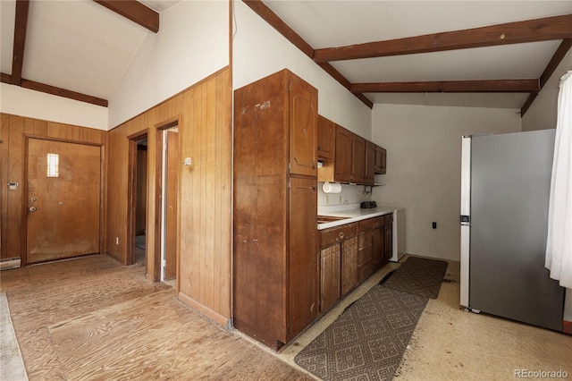 23976 County Rd 50, Fraser, CO 80442 - kitchen with freestanding refrigerator, light countertops, and a baseboard heating unit