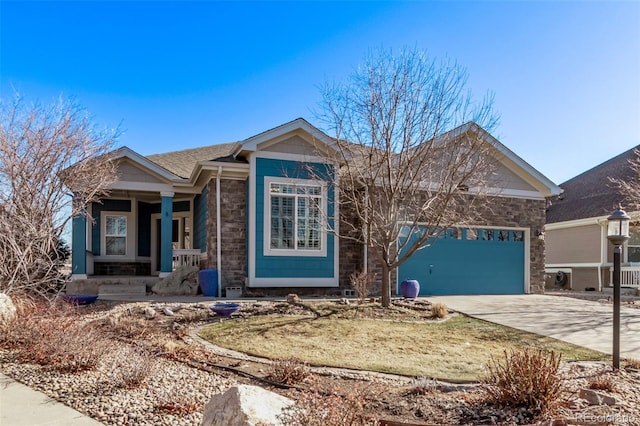 single story home featuring a garage and concrete driveway