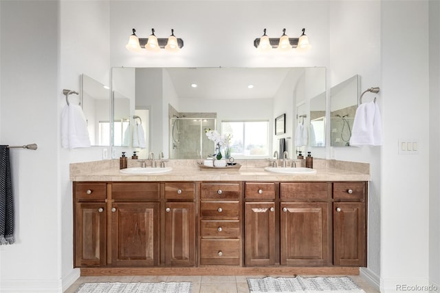 8802 E 148th Ln, Thornton, CO 80602 - bathroom featuring a shower stall, double vanity, and tile patterned floors