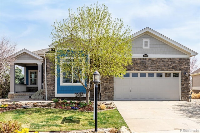 8802 E 148th Ln, Thornton, CO 80602 - view of front facade with stone siding, concrete driveway, a front lawn, and a garage