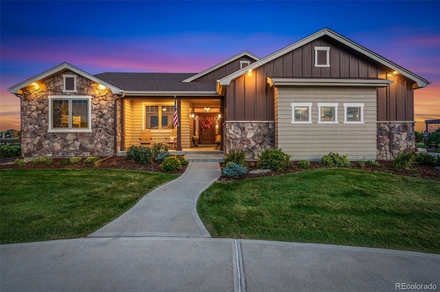 view of front of house with a yard