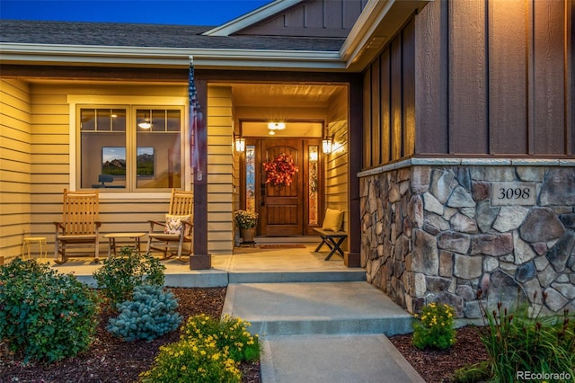 entrance to property featuring covered porch