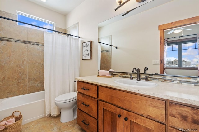 full bathroom featuring vanity, tile patterned floors, toilet, and shower / tub combo with curtain